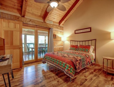 Discover your peaceful forest retreat in this inviting 3-bedroom on Cortez Golf Course in Arkansas - for sale on GolfHomes.com, golf home, golf lot
