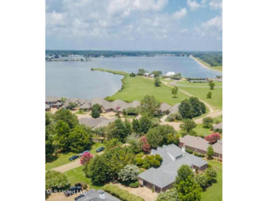 A southern dream on the 18th hole with breath taking waterfront on Lake Caroline Golf Club in Mississippi - for sale on GolfHomes.com, golf home, golf lot
