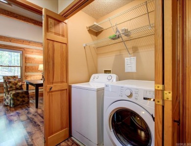 Discover your peaceful forest retreat in this inviting 3-bedroom on Cortez Golf Course in Arkansas - for sale on GolfHomes.com, golf home, golf lot