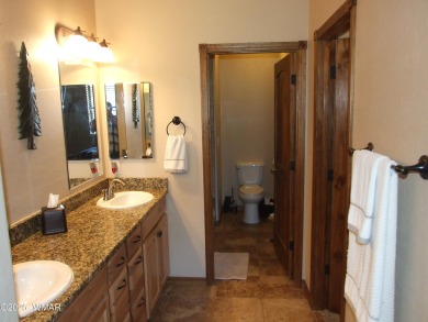 Gorgeous getaway in the beautiful White Mountains of Arizona on Bison Golf and Country Club in Arizona - for sale on GolfHomes.com, golf home, golf lot