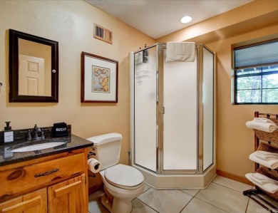 Discover your peaceful forest retreat in this inviting 3-bedroom on Cortez Golf Course in Arkansas - for sale on GolfHomes.com, golf home, golf lot