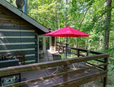 Discover your peaceful forest retreat in this inviting 3-bedroom on Cortez Golf Course in Arkansas - for sale on GolfHomes.com, golf home, golf lot