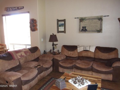 Gorgeous getaway in the beautiful White Mountains of Arizona on Bison Golf and Country Club in Arizona - for sale on GolfHomes.com, golf home, golf lot
