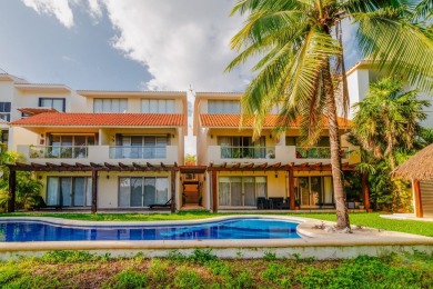 Experience luxury living in Puerto Aventuras with this beautiful on Club De Golf Puerto Aventuras in  - for sale on GolfHomes.com, golf home, golf lot