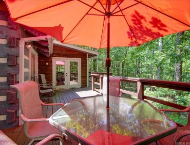 Discover your peaceful forest retreat in this inviting 3-bedroom on Cortez Golf Course in Arkansas - for sale on GolfHomes.com, golf home, golf lot