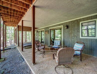 Discover your peaceful forest retreat in this inviting 3-bedroom on Cortez Golf Course in Arkansas - for sale on GolfHomes.com, golf home, golf lot