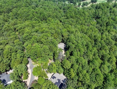 Discover your peaceful forest retreat in this inviting 3-bedroom on Cortez Golf Course in Arkansas - for sale on GolfHomes.com, golf home, golf lot