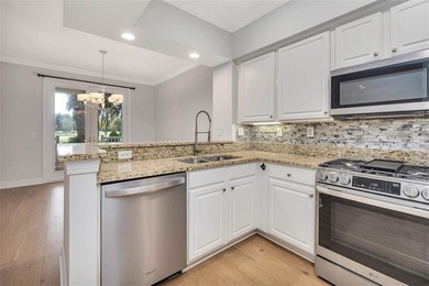 This condo faces a spectacular view of Butler Lake and the King on The King and Prince Golf Course, Home of the Hampton Club in Georgia - for sale on GolfHomes.com, golf home, golf lot