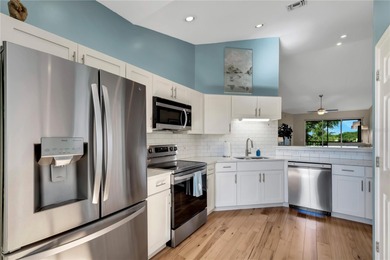 TURN-KEY FURNISHED CONDO . . . Simply bring your clothes & a on Grasslands Golf and Country Club in Florida - for sale on GolfHomes.com, golf home, golf lot