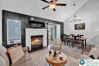 Escape. Earn. Enjoy. This end-unit townhome filled with modern on Jack Frost National Golf Course in Pennsylvania - for sale on GolfHomes.com, golf home, golf lot