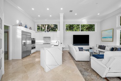 This airy custom built home sits on a half acre lot with on Old Marsh Golf Club in Florida - for sale on GolfHomes.com, golf home, golf lot