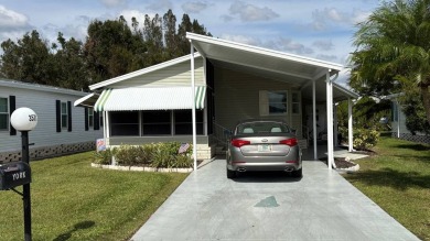 This quintessential Florida home is a perfect winter get-away or on Sabal Springs Golf and Racquet Club in Florida - for sale on GolfHomes.com, golf home, golf lot