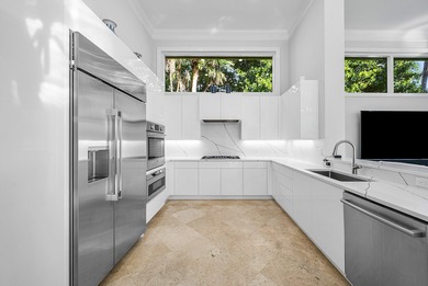 This airy custom built home sits on a half acre lot with on Old Marsh Golf Club in Florida - for sale on GolfHomes.com, golf home, golf lot