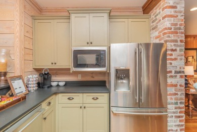 The Carnoustie Cottage is where luxury meets leisure. This on Champions Retreat Golf Club in Georgia - for sale on GolfHomes.com, golf home, golf lot