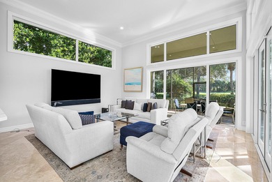 This airy custom built home sits on a half acre lot with on Old Marsh Golf Club in Florida - for sale on GolfHomes.com, golf home, golf lot