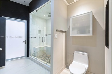 Oversized 1-bedroom loft-style condo (802 SF) at The Meridian on Miami Beach Golf Club in Florida - for sale on GolfHomes.com, golf home, golf lot