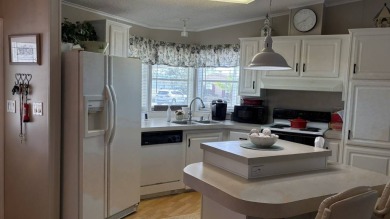 This quintessential Florida home is a perfect winter get-away or on Sabal Springs Golf and Racquet Club in Florida - for sale on GolfHomes.com, golf home, golf lot