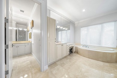 This airy custom built home sits on a half acre lot with on Old Marsh Golf Club in Florida - for sale on GolfHomes.com, golf home, golf lot