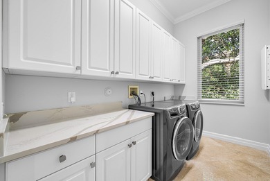 Fabulous custom home sited on a half acre lot with dramatic on Old Marsh Golf Club in Florida - for sale on GolfHomes.com, golf home, golf lot