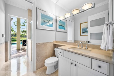 Fabulous custom home sited on a half acre lot with dramatic on Old Marsh Golf Club in Florida - for sale on GolfHomes.com, golf home, golf lot