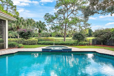 Fabulous custom home sited on a half acre lot with dramatic on Old Marsh Golf Club in Florida - for sale on GolfHomes.com, golf home, golf lot