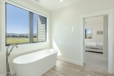 Welcome to this gorgeous 4-bedroom home perfectly positioned on on Grand Elk Ranch and Club in Colorado - for sale on GolfHomes.com, golf home, golf lot