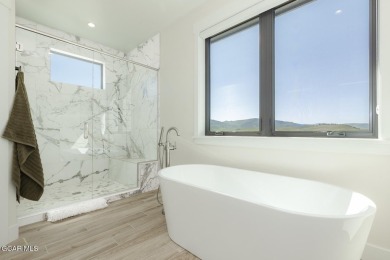 Welcome to this gorgeous 4-bedroom home perfectly positioned on on Grand Elk Ranch and Club in Colorado - for sale on GolfHomes.com, golf home, golf lot