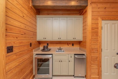The Carnoustie Cottage is where luxury meets leisure. This on Champions Retreat Golf Club in Georgia - for sale on GolfHomes.com, golf home, golf lot