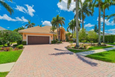 Beautifully appointed, welcoming home with split bedrooms and on Bocaire Country Club in Florida - for sale on GolfHomes.com, golf home, golf lot