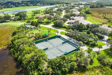 Fabulous custom home sited on a half acre lot with dramatic on Old Marsh Golf Club in Florida - for sale on GolfHomes.com, golf home, golf lot