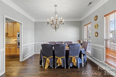 Beautifully updated 5BR, 2.5BA home in Highland Creek featuring on Highland Creek Golf Club in North Carolina - for sale on GolfHomes.com, golf home, golf lot