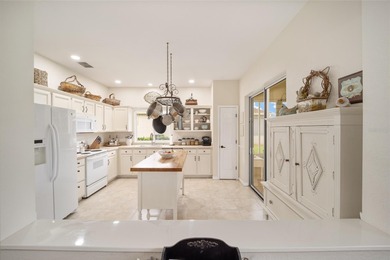 This centrally located San Mateo home, built with concrete block on Eagle Ridge At Spruce Creek Country Club in Florida - for sale on GolfHomes.com, golf home, golf lot