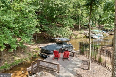 Lake Access and Private Dock! This Charming Lakeside Retreat is on The Highlands Course at Lake Arrowhead in Georgia - for sale on GolfHomes.com, golf home, golf lot