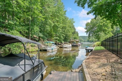 Lake Access and Private Dock! This Charming Lakeside Retreat is on The Highlands Course at Lake Arrowhead in Georgia - for sale on GolfHomes.com, golf home, golf lot