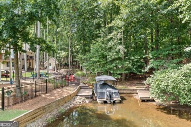 Lake Access and Private Dock! This Charming Lakeside Retreat is on The Highlands Course at Lake Arrowhead in Georgia - for sale on GolfHomes.com, golf home, golf lot
