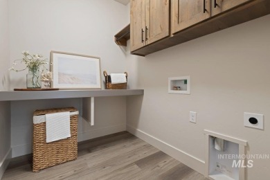 Thoughtfully designed single-level floor plan offers 3 bedrooms on Hunters Point Golf Club in Idaho - for sale on GolfHomes.com, golf home, golf lot