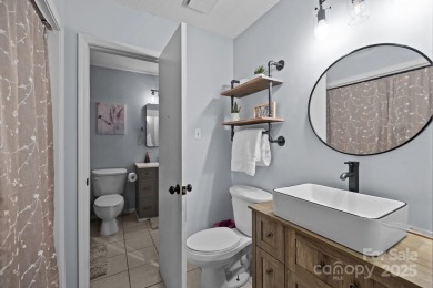 Adorable Bungalow home with tons of charm and privacy in the on Tega Cay Golf Club in South Carolina - for sale on GolfHomes.com, golf home, golf lot