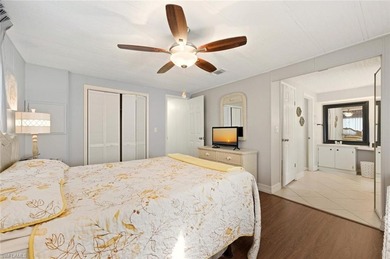 This polished home has updates throughout, a screened-in lanai on Riviera Golf Club in Florida - for sale on GolfHomes.com, golf home, golf lot