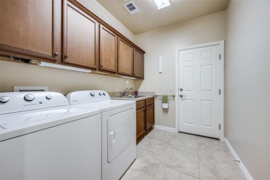 SCHEDULE YOUR BUYERS NOW AS THIS BEAUTY IS THE BEST PRICED HOME on Wildhorse Golf Club of Robson Ranch in Texas - for sale on GolfHomes.com, golf home, golf lot