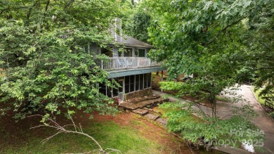 Adorable Bungalow home with tons of charm and privacy in the on Tega Cay Golf Club in South Carolina - for sale on GolfHomes.com, golf home, golf lot