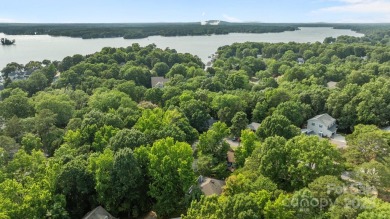 Adorable Bungalow home with tons of charm and privacy in the on Tega Cay Golf Club in South Carolina - for sale on GolfHomes.com, golf home, golf lot