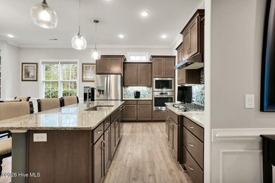 The Carot Bay by Kent Homes in the Leewards at Shelmore in on Cape Fear National At Brunswick Forest in North Carolina - for sale on GolfHomes.com, golf home, golf lot