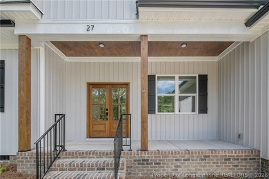 Welcome to this beautifully crafted 4 bedroom, 3 bath home on Carolina Lakes Country Club in North Carolina - for sale on GolfHomes.com, golf home, golf lot