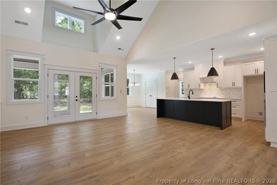 Welcome to this beautifully crafted 4 bedroom, 3 bath home on Carolina Lakes Country Club in North Carolina - for sale on GolfHomes.com, golf home, golf lot