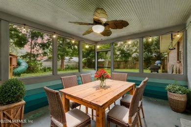 Nestled within a canopy of lush trees, this charming 1960s home on Blue Cypress Golf Club in Florida - for sale on GolfHomes.com, golf home, golf lot