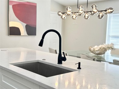 This is your chance to own a beautifully updated pool home! on Southern Dunes Golf and Country Club in Florida - for sale on GolfHomes.com, golf home, golf lot