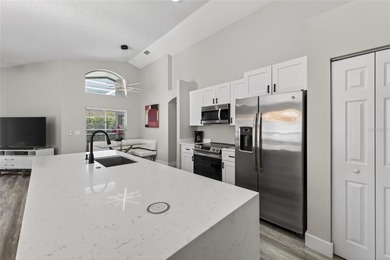 This is your chance to own a beautifully updated pool home! on Southern Dunes Golf and Country Club in Florida - for sale on GolfHomes.com, golf home, golf lot