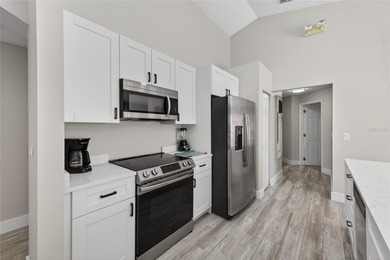 This is your chance to own a beautifully updated pool home! on Southern Dunes Golf and Country Club in Florida - for sale on GolfHomes.com, golf home, golf lot