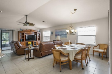 Beautiful CBC home backing to canal.  Magnificent landscaping on Spanish Lakes I in Florida - for sale on GolfHomes.com, golf home, golf lot