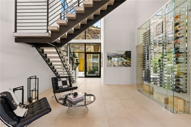 Perched in prestigious MacDonald Highlands, this luxury on Dragon Ridge Country Club in Nevada - for sale on GolfHomes.com, golf home, golf lot